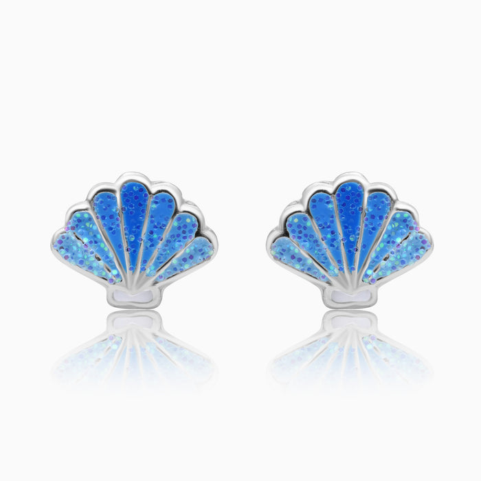 A pair of silver shell-shaped earrings with blue screw-back closures.