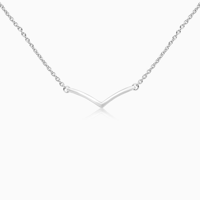 A silver necklace with a simple, elegant design featuring a bright finish.