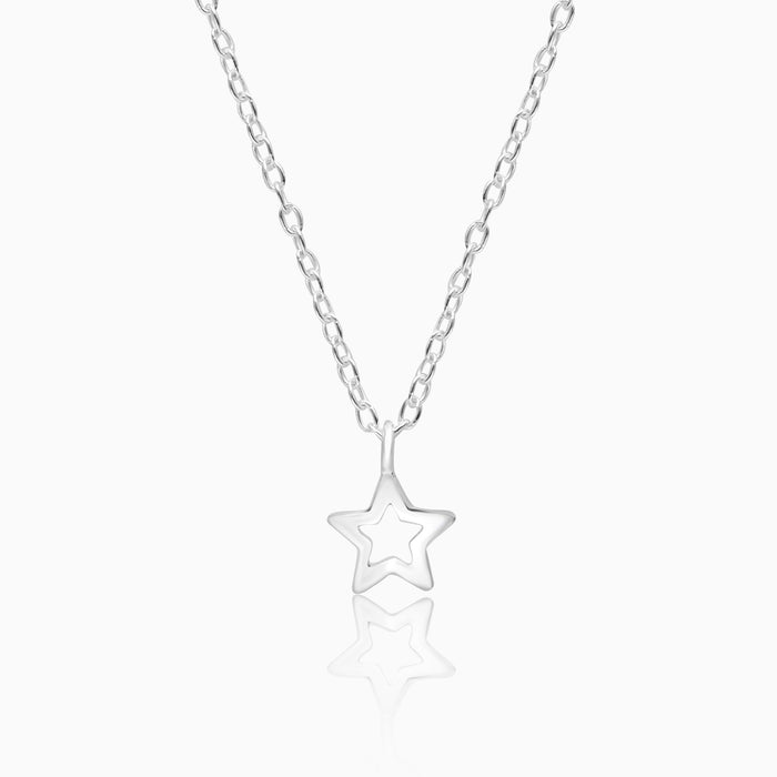 A silver necklace with a star-shaped pendant, displayed against a white background.