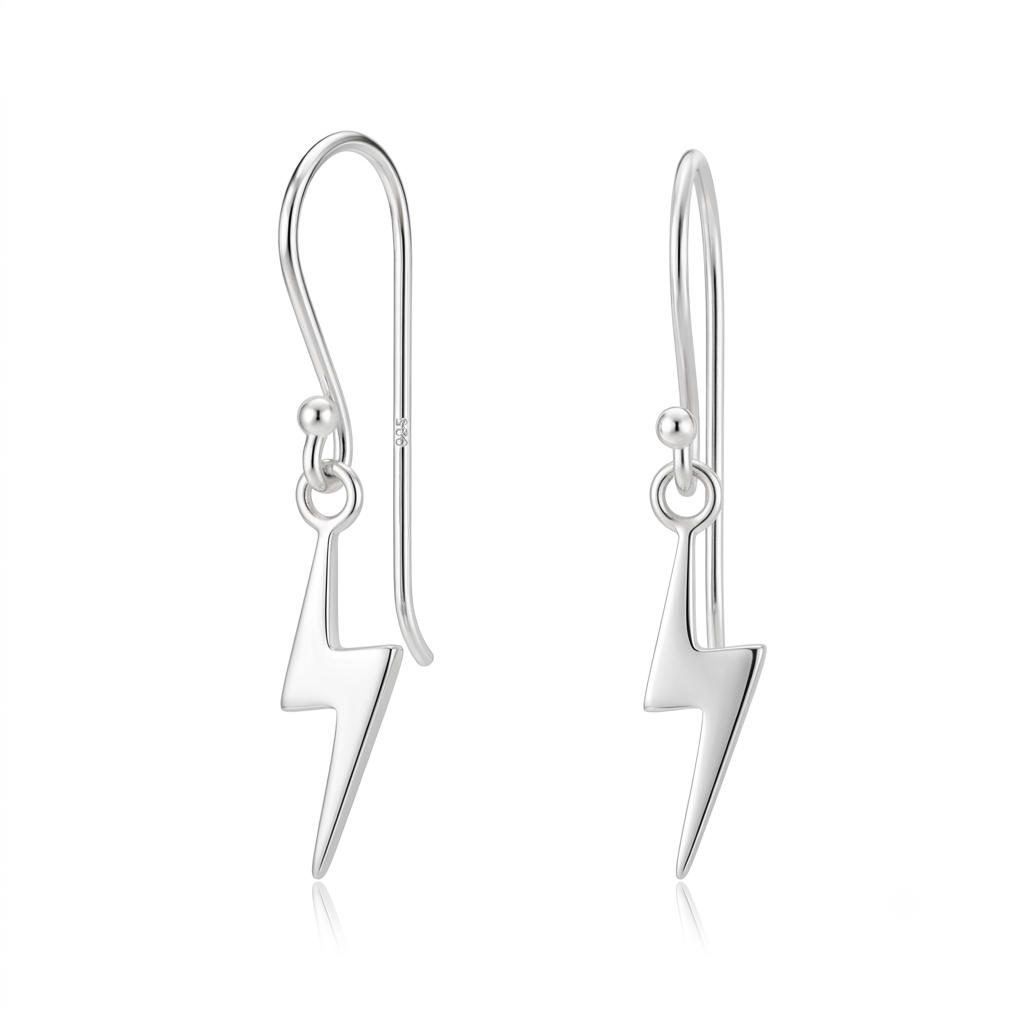 A pair of silver lightning bolt drop earrings with fishhook backs, displayed on a clean white background with a subtle reflection.
