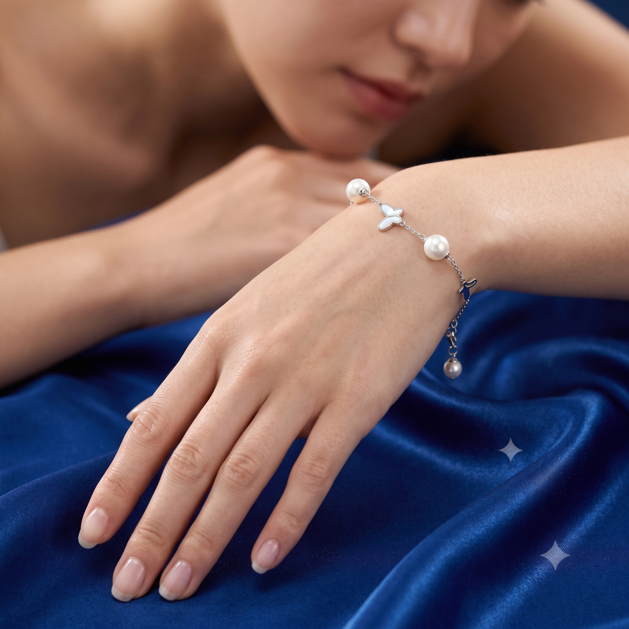 Silver Dangling Butterfly Pearl Bracelet