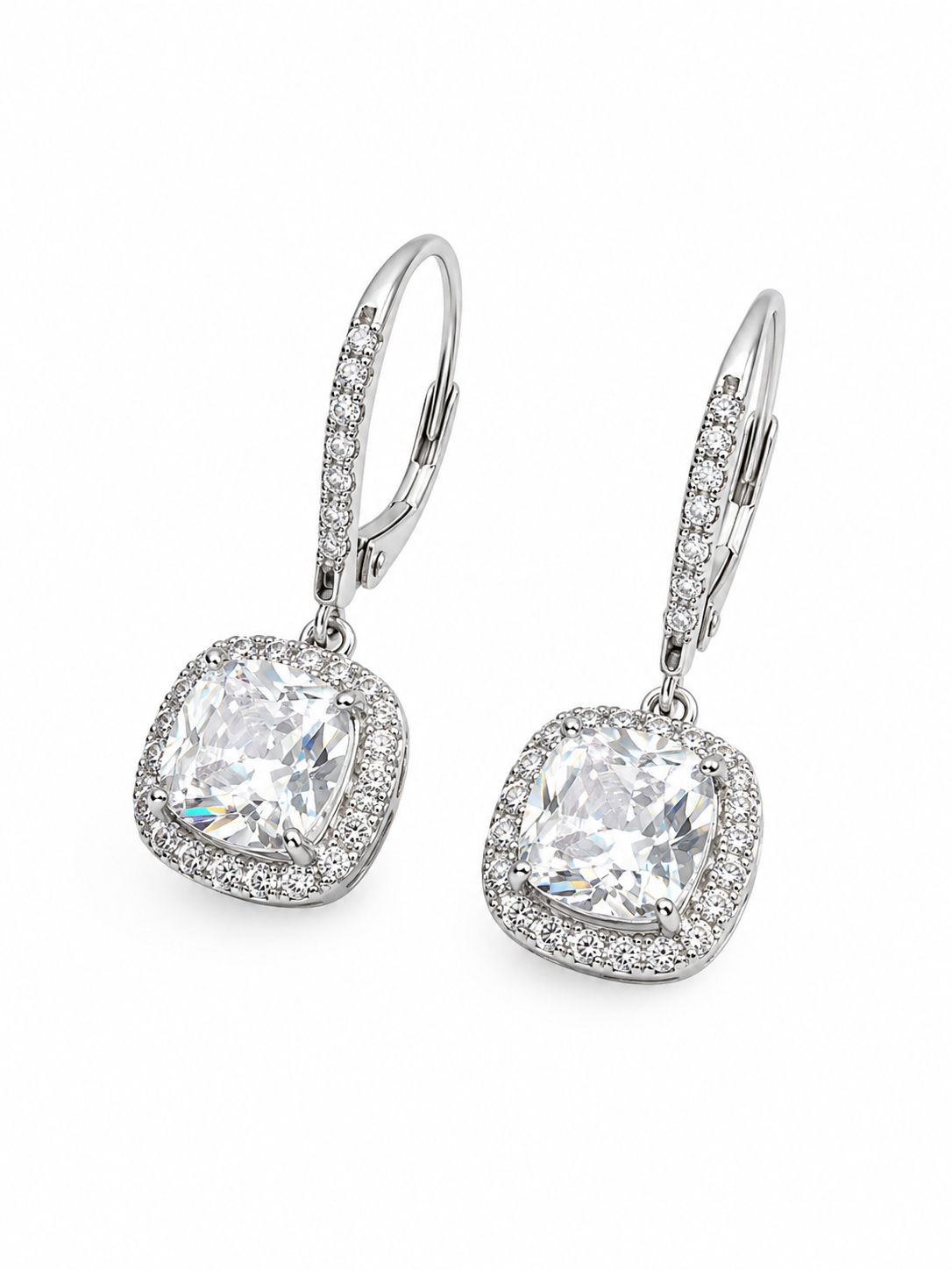A pair of silver leverback earrings featuring cushion-cut clear gemstones surrounded by a halo of small pavé-set stones, shown on a clean white background.