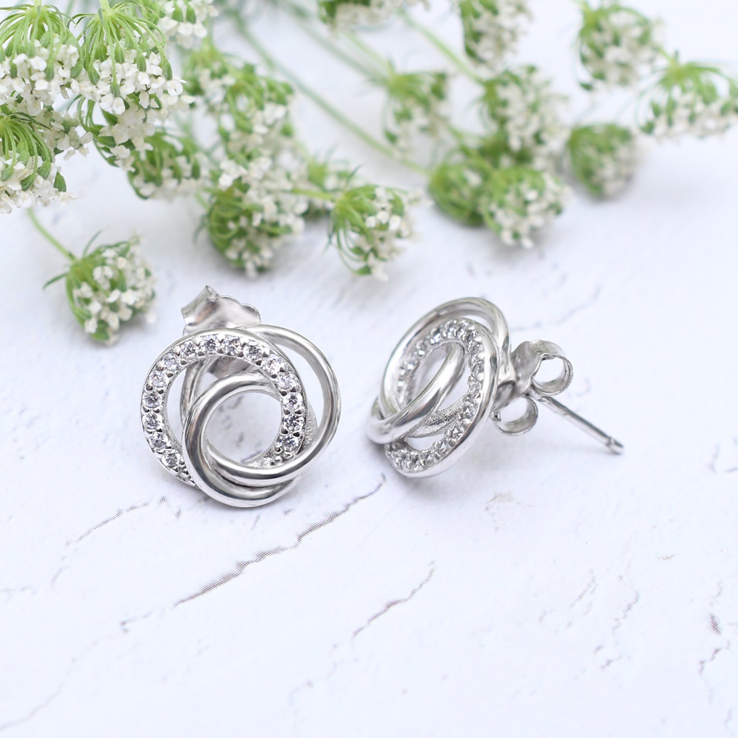 Silver Intertwined Sparkling Hoops Earrings