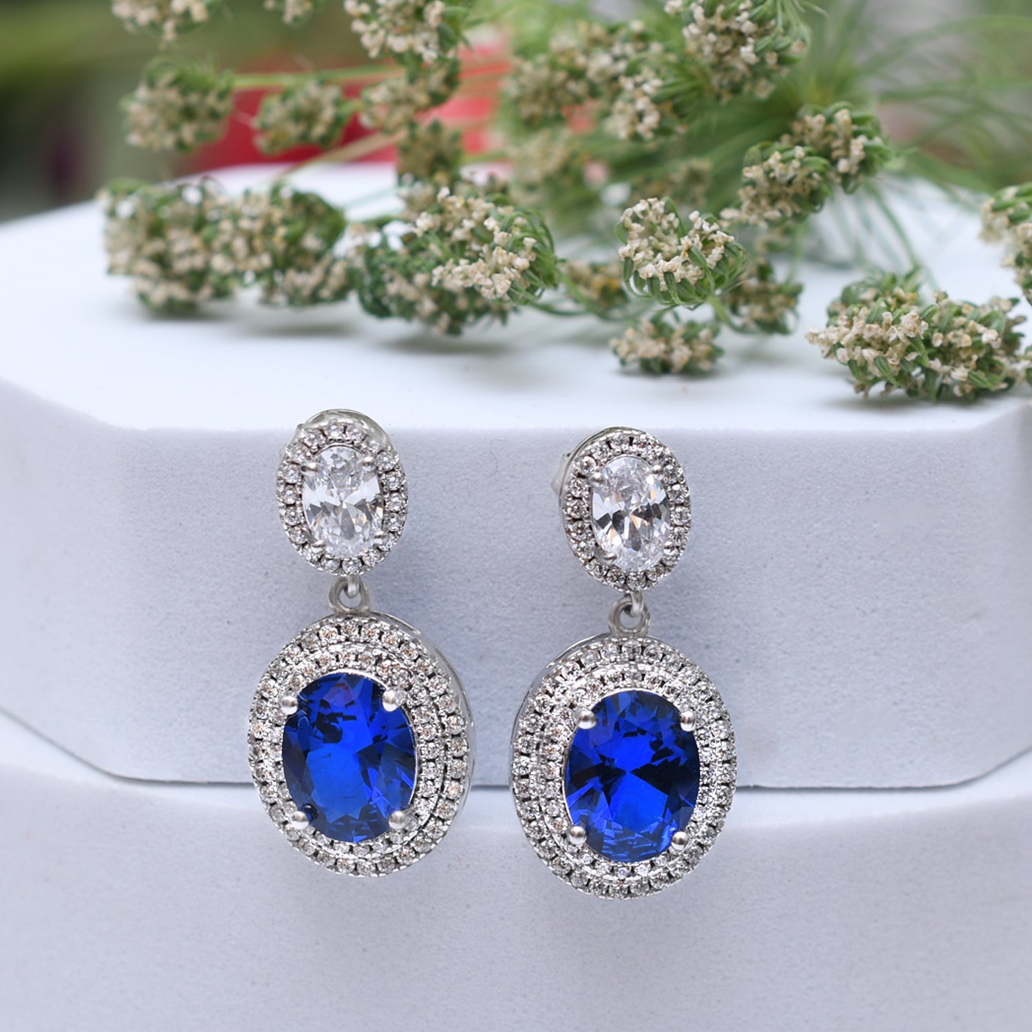 Silver Dangling Queen Sapphire Blue Earrings