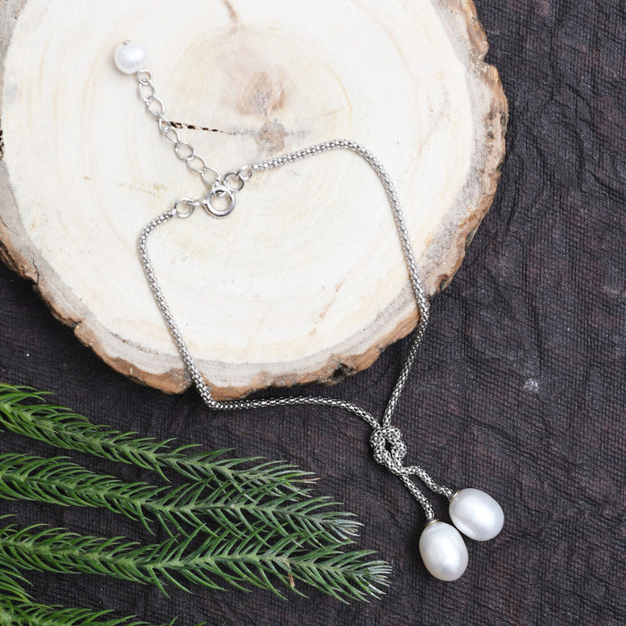 Silver Knotted Dangling Pearls Bracelet